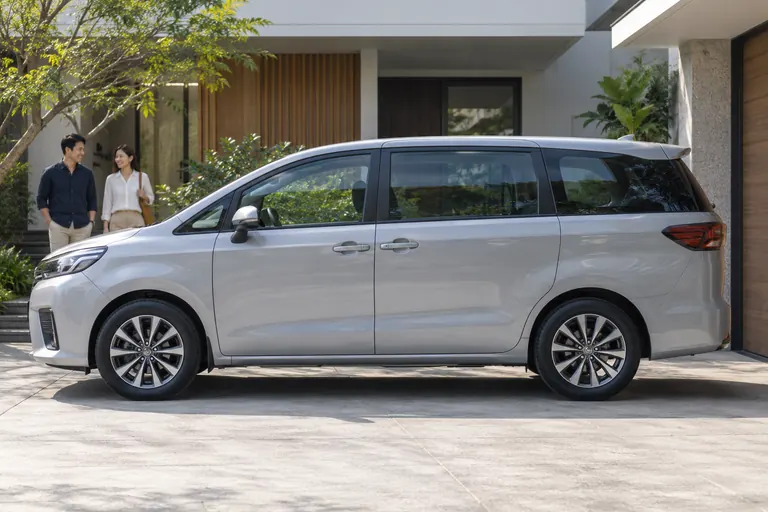 Side view of an MPV for access context. Illustrative customer context.